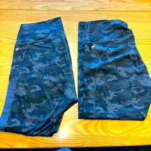 2 pairs of women’s Fabletics leggings in Camo, size XL.